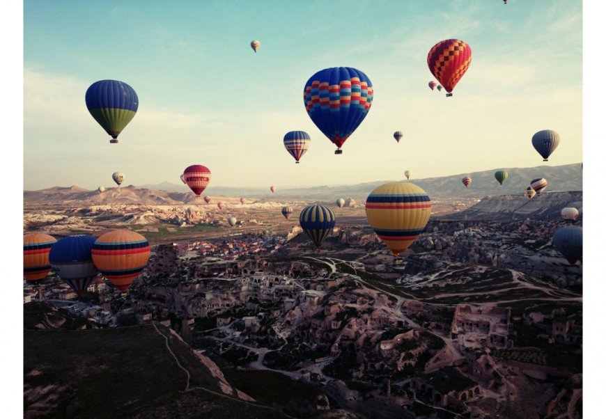 Cappadocia, Turkey - Marvel at the unique rock formations, take a hot air balloon ride, and explore ancient underground cities.